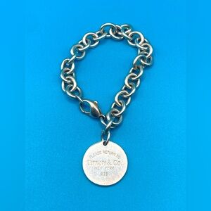 Vintage Return to Tiffany@co round tag/disc bracelet 7.5” Sterling